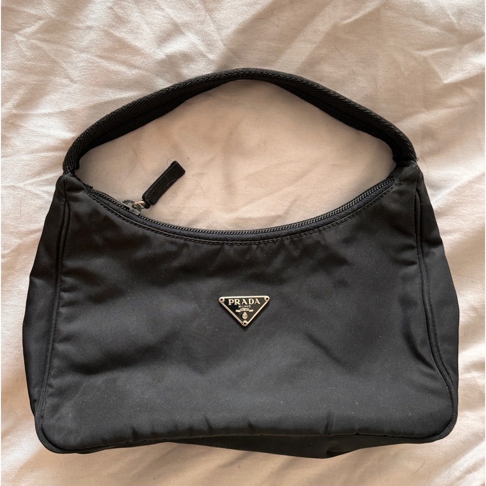 prada nylon — authentic, bought second hand with this authentication paperwork